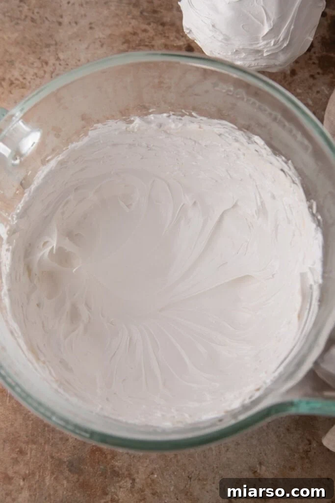 mixed ingredients in a bowl before stiff peaks