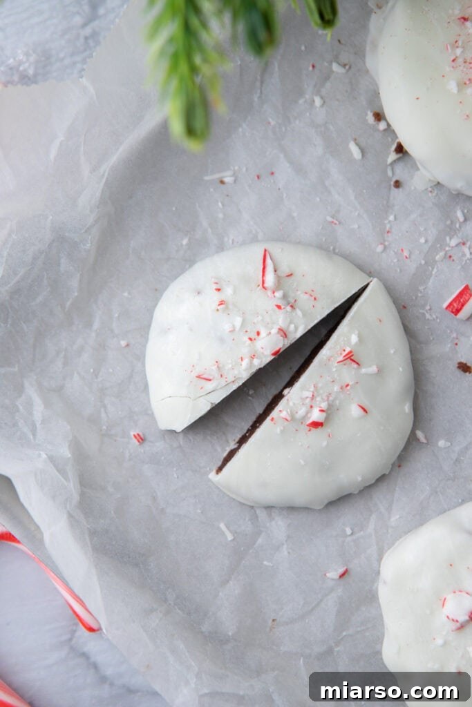 Irresistible Peppermint Bark Cookies 13 Peppermint bark cookie split in half to show its soft interior.