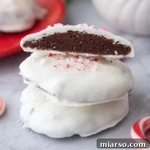 Irresistible Peppermint Bark Cookies 15 peppermint bark cookies stacked on top of each other