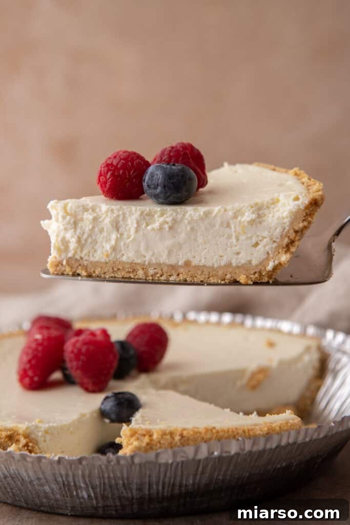 High Protein Cottage Cheese Cheesecake being scooped up