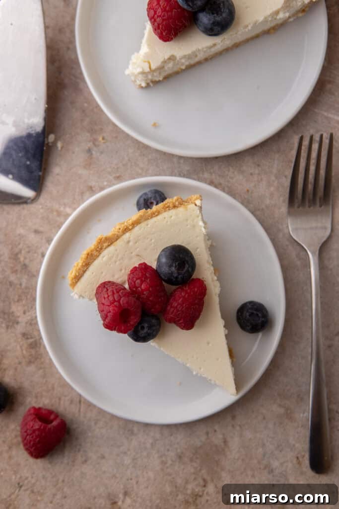 a High Protein Cottage Cheese Cheesecake slices on plate