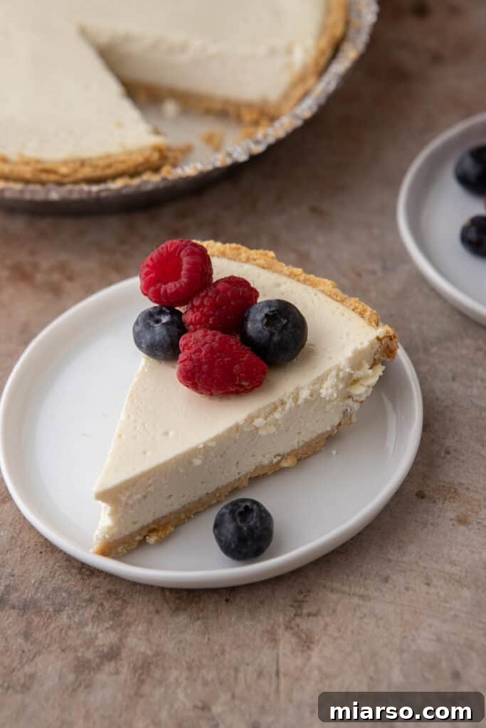 a High Protein Cottage Cheese Cheesecake slices on plate