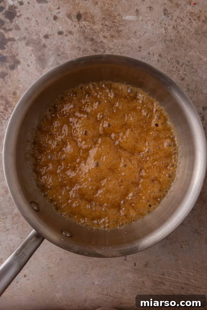 Sweet & Salty Holiday Ritz Toffee Bark 7 ingredients in a pot