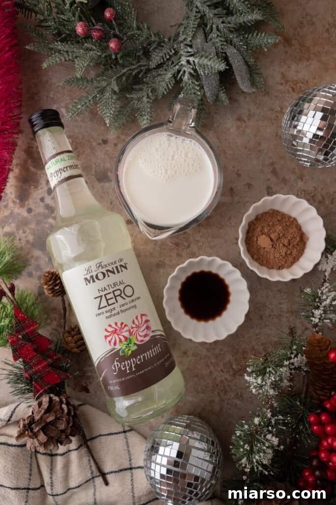 The Ultimate DIY Peppermint Mocha Creamer 3 Ingredients for Homemade Peppermint Mocha Creamer on a wooden table