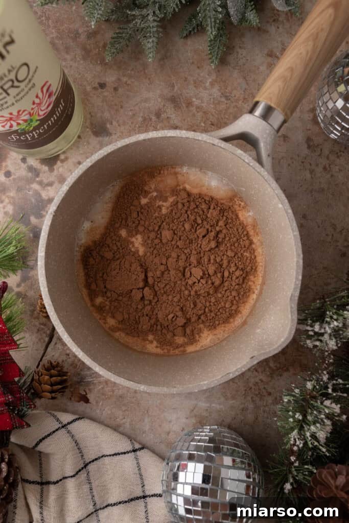 The Ultimate DIY Peppermint Mocha Creamer 5 Peppermint Mocha Creamer mixture in a pot during heating