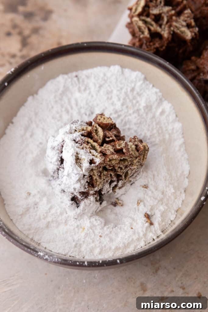 Irresistible Muddy Buddy Bars 12 chocolate cereal squares dipped in powdered sugar