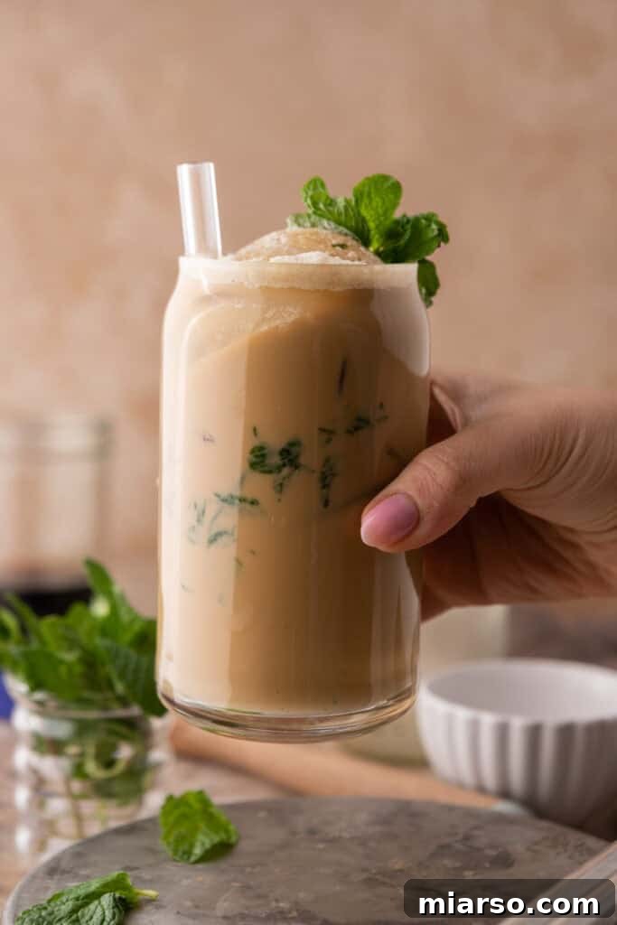 DIY Phylz Mint Mojito Iced Coffee 12 hand holding cup of coffee