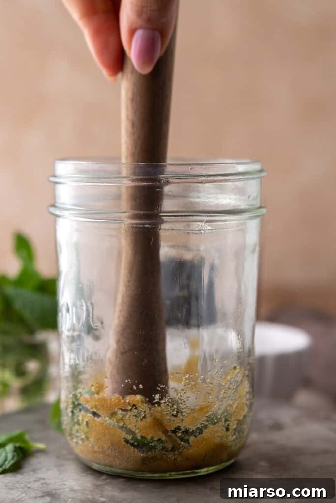 DIY Phylz Mint Mojito Iced Coffee 5 Hand muddling mint and brown sugar
