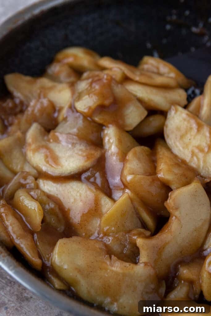 Effortless Apple Filling for Delicious Desserts 12 A close-up of tender, spiced apple chunks, highlighting the perfect texture.