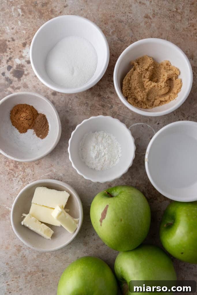 Effortless Apple Filling for Delicious Desserts 3 Fresh, vibrant ingredients for homemade apple filling laid out on a clean surface.
