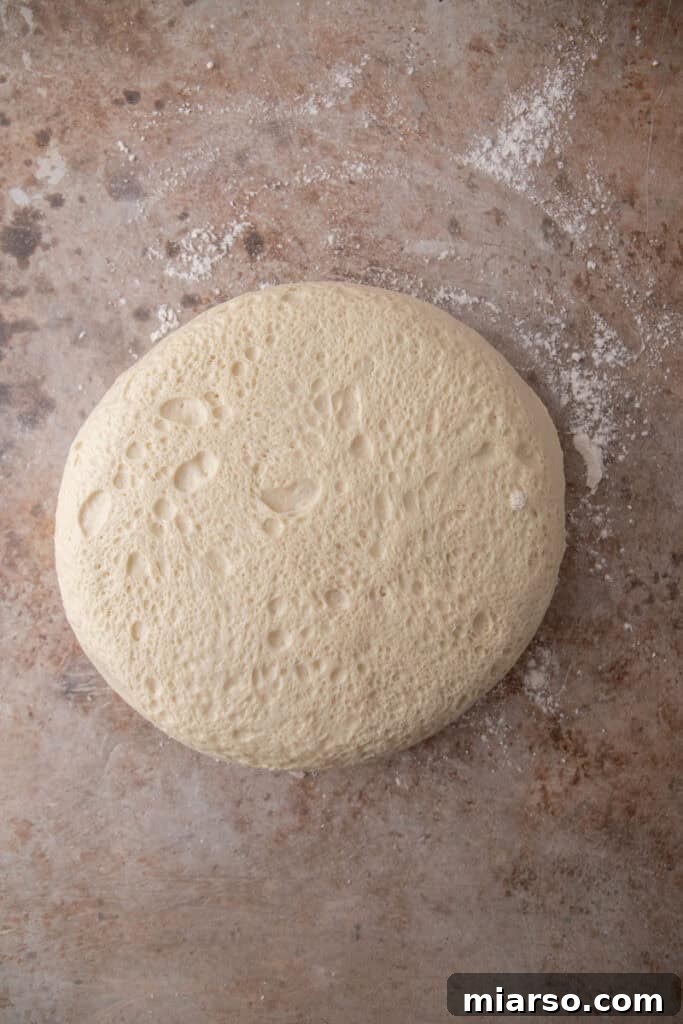 rested dough on a work surface