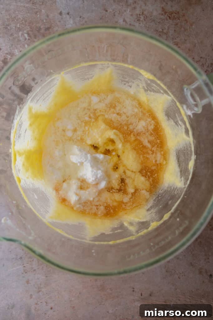 Eggs being incorporated into the mixture