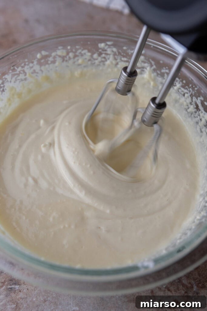 Ingredients for cake release being mixed together in a bowl.