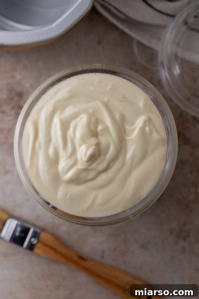 Homemade Cake Release stored neatly in a clear mason jar.