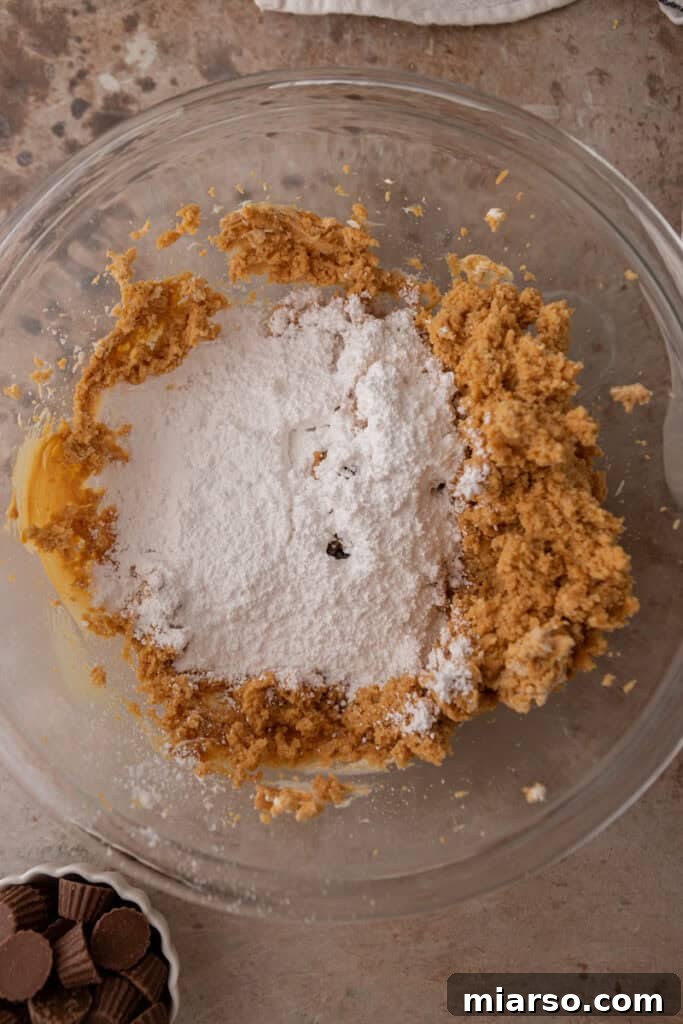 Fully mixed cream cheese and peanut butter, smooth and creamy in the bowl.