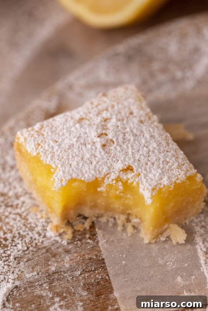 Small Batch Lemon Bars recipe with a bite taken out