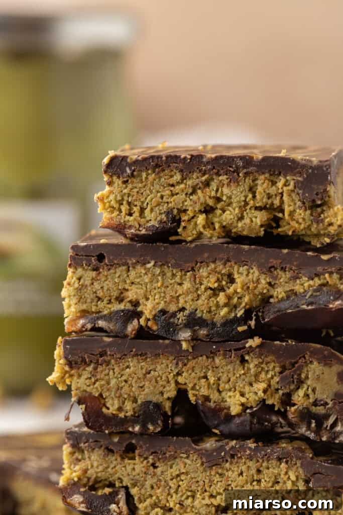 Stacked pieces of viral Dubai Chocolate Date Bark, showcasing its layers and rich texture.