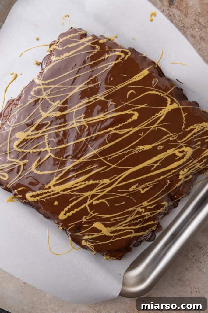 Chilled Dubai Chocolate Date Bark, showing the distinct layers before cutting.