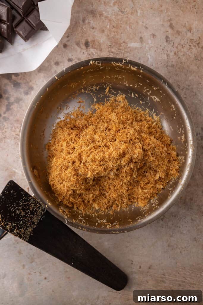 Close-up of golden brown toasted kataifi in a pan, ready for the next step.