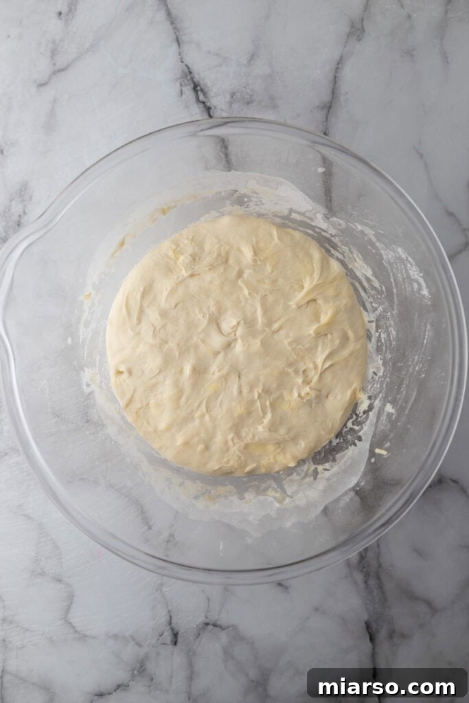 Elevate Your Baking Perfect Sourdough Croissant Bread 13 dough being bulk fermented