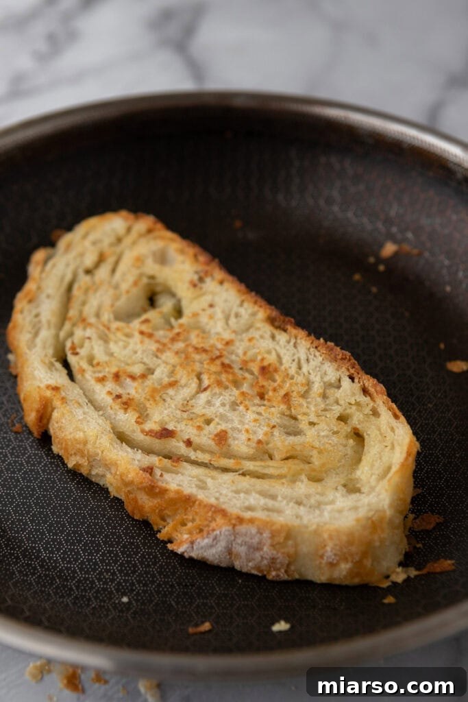 Elevate Your Baking Perfect Sourdough Croissant Bread 22 croissant sourdough bread recipe slices on a pan