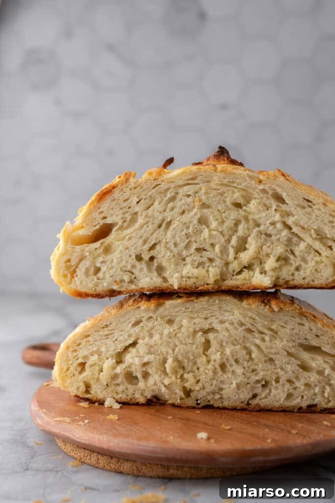 Elevate Your Baking Perfect Sourdough Croissant Bread 23 croissant sourdough bread recipe halves stacked on top of each other