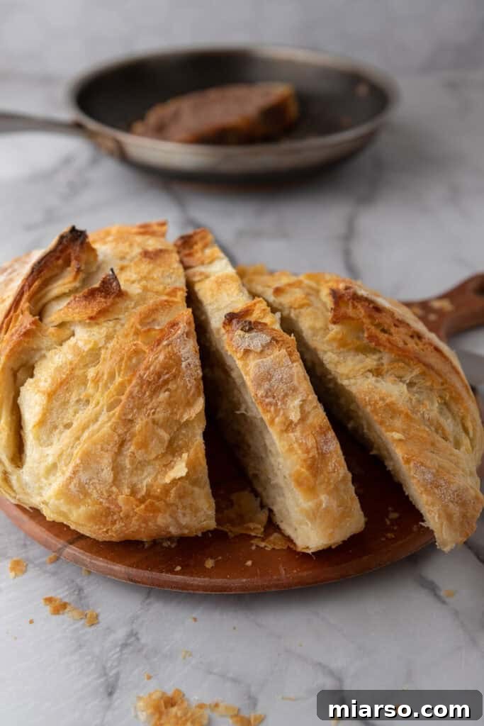 Elevate Your Baking Perfect Sourdough Croissant Bread 26 loaf of Croissant Sourdough Bread Recipe sliced up