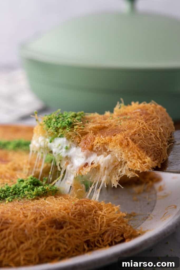 slice of the easy kunafa recipe with simple ingredients being pulled up