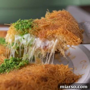 slice of the easy kunafa recipe with simple ingredients being pulled up