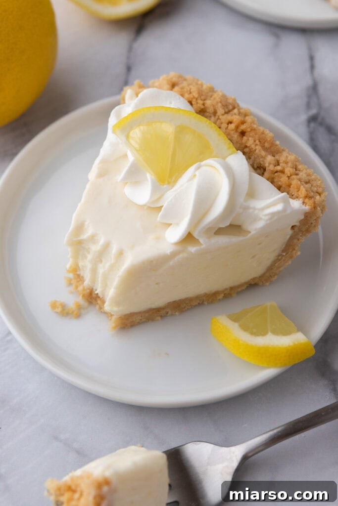 Zesty No Bake Lemon Pie Perfection 10 no bake lemon pie overhead shot of a slice