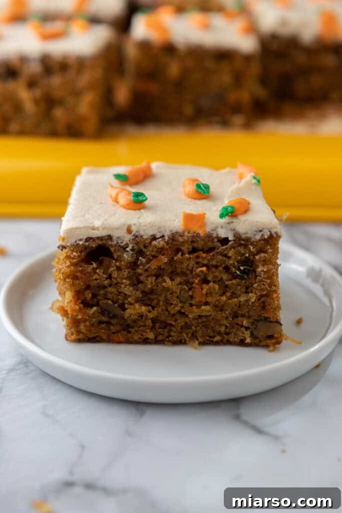 a slice of the Carrot Cake Sheet Cake