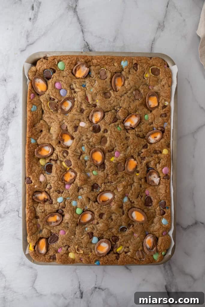 Cookie dough in a pan, ready for baking.