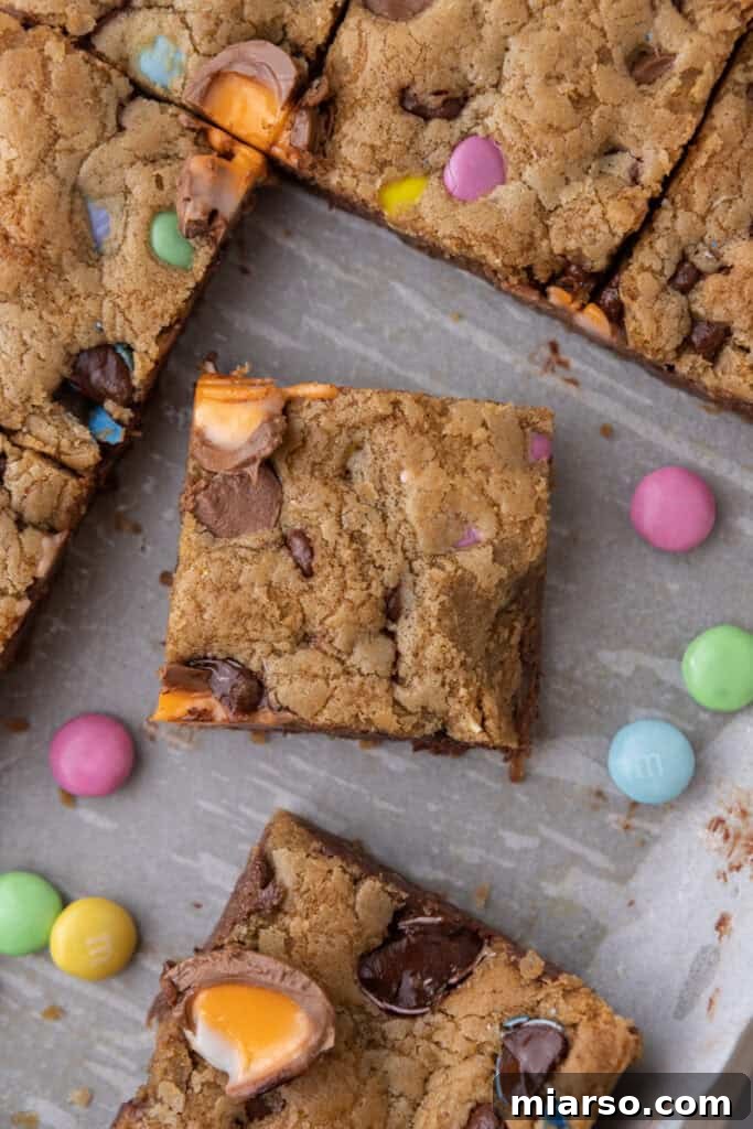 An overhead shot of a pan of freshly baked Cadbury Egg Chocolate Chip Easter Cookie Bars.