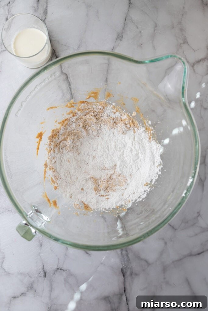 Irresistible Brown Butter Frosting 6 unmixed ingredients in a bowl
