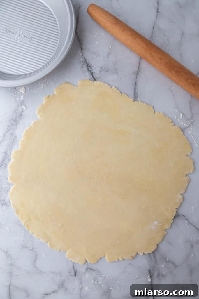 Perfect Flaky Sourdough Discard Pie Crust 13 dough on a lightly floured surface