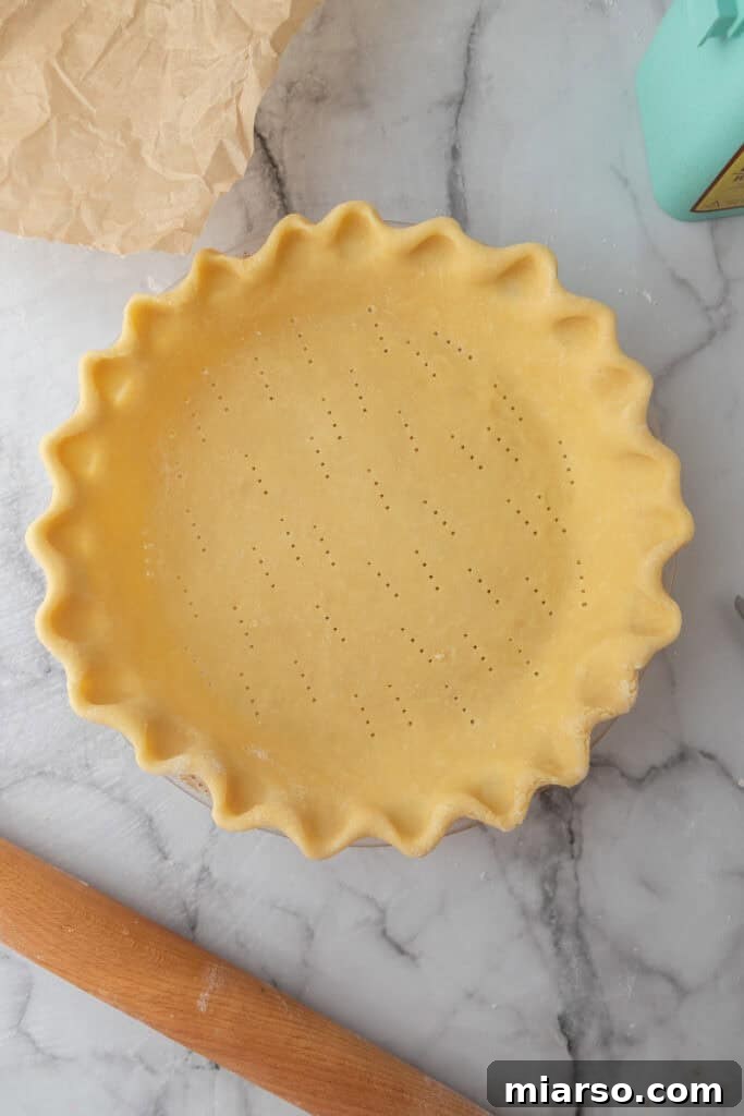 Perfect Flaky Sourdough Discard Pie Crust 15 dough in a pie pan