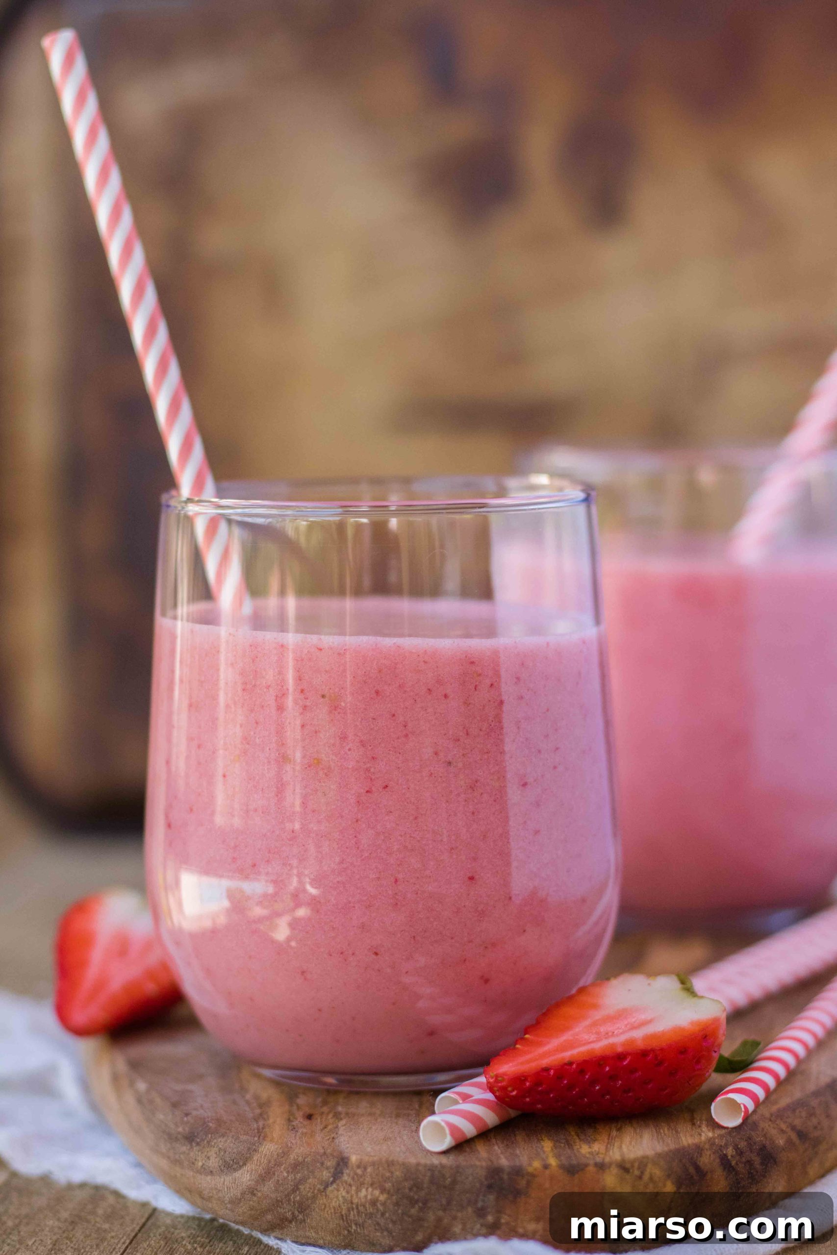 banana strawberry smoothie with yogurt and optional whipped cream