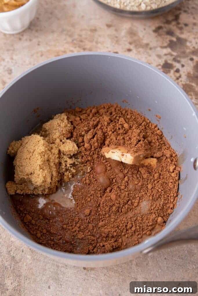 Decadent No Bake Chocolate Oatmeal Treats 5 Wet ingredients for no-bake cookies in a saucepan