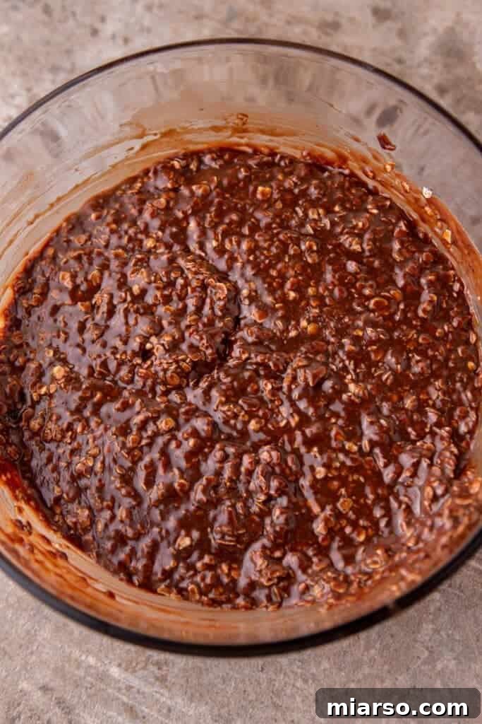 Decadent No Bake Chocolate Oatmeal Treats 8 Chocolate oatmeal cookie mixture ready for scooping