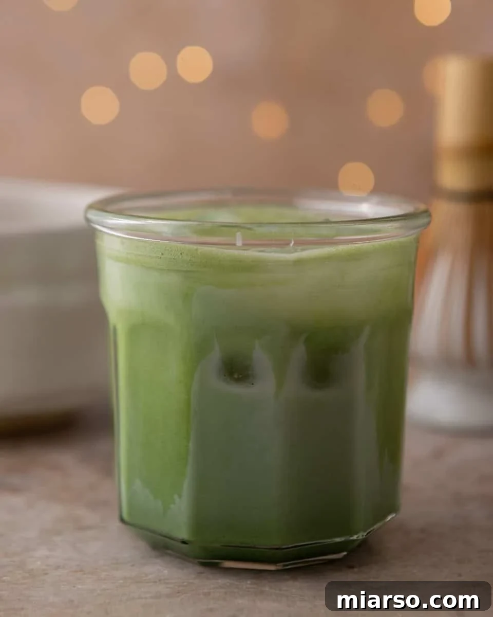 Salted maple matcha latte over ice with creamy milk
