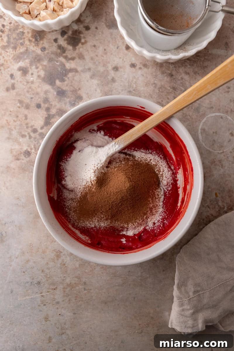 Flour and cocoa powder added to cookie dough