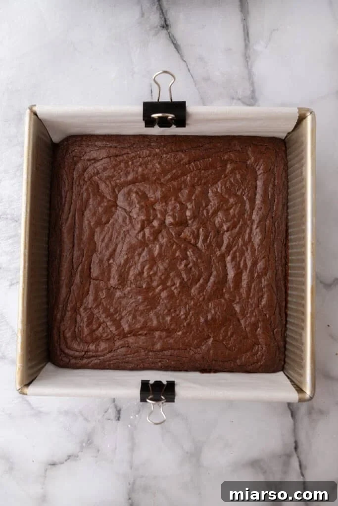 Dubai's Viral Pistachio Kunafa Brownies 13 baked batter in a pan, cooled
