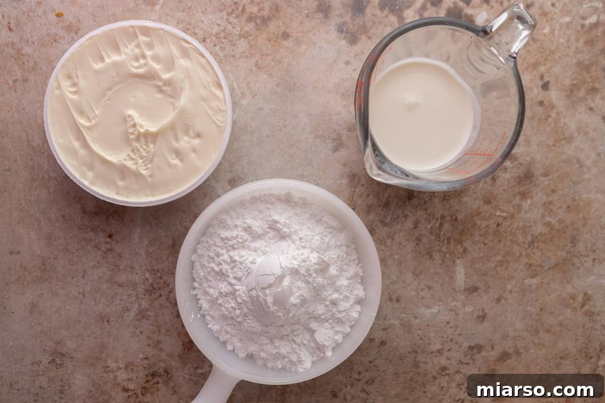 Vanilla mascarpone frosting ingredients for Black Forest cinnamon rolls