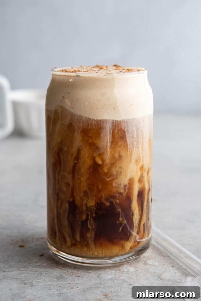 Starbucks copycat pumpkin cream cold brew topped with spiced pumpkin cold foam and cinnamon