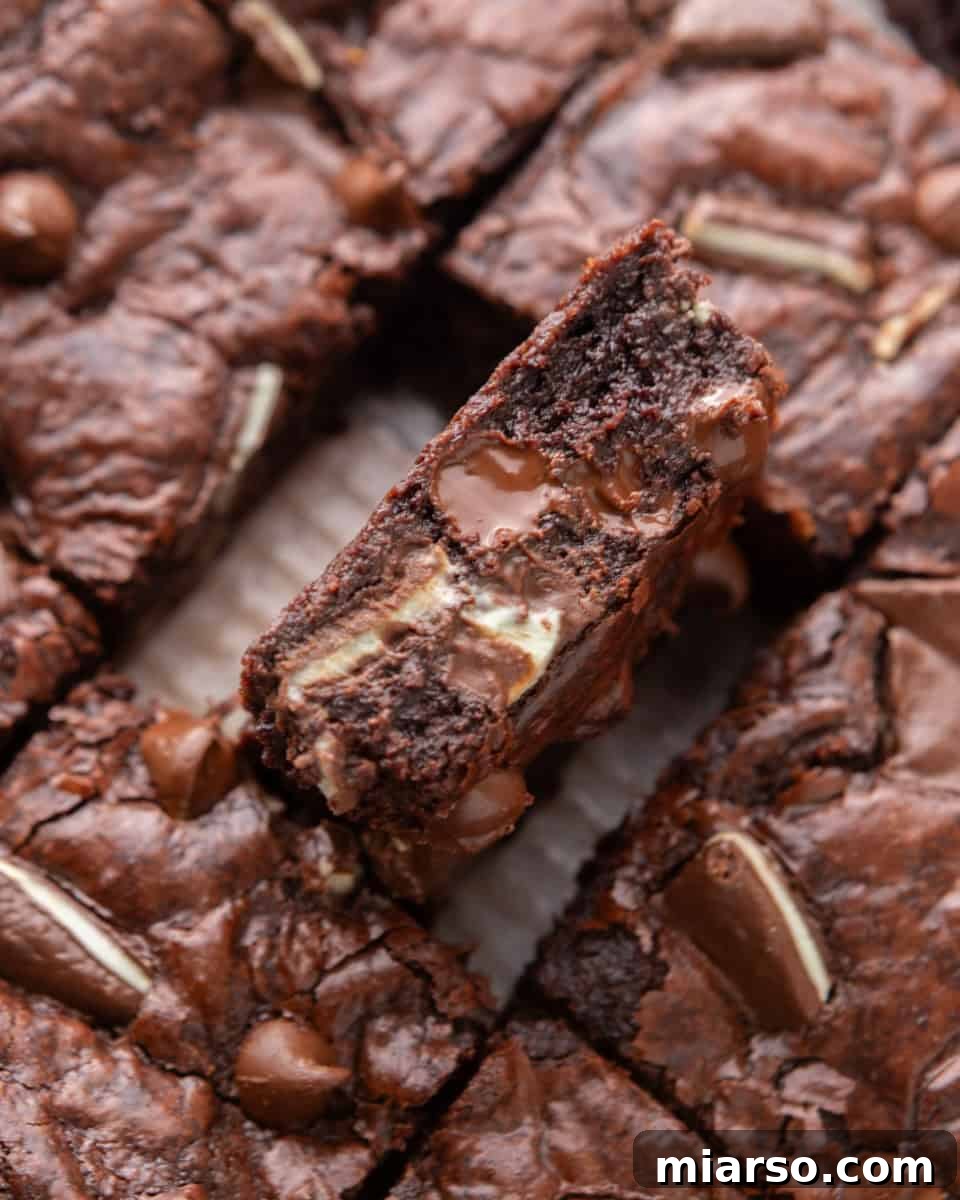 Rich fudgy Andes Mint Brownies with a crinkly top, loaded with Andes mint chocolate chips, with a subtle hint of mint.