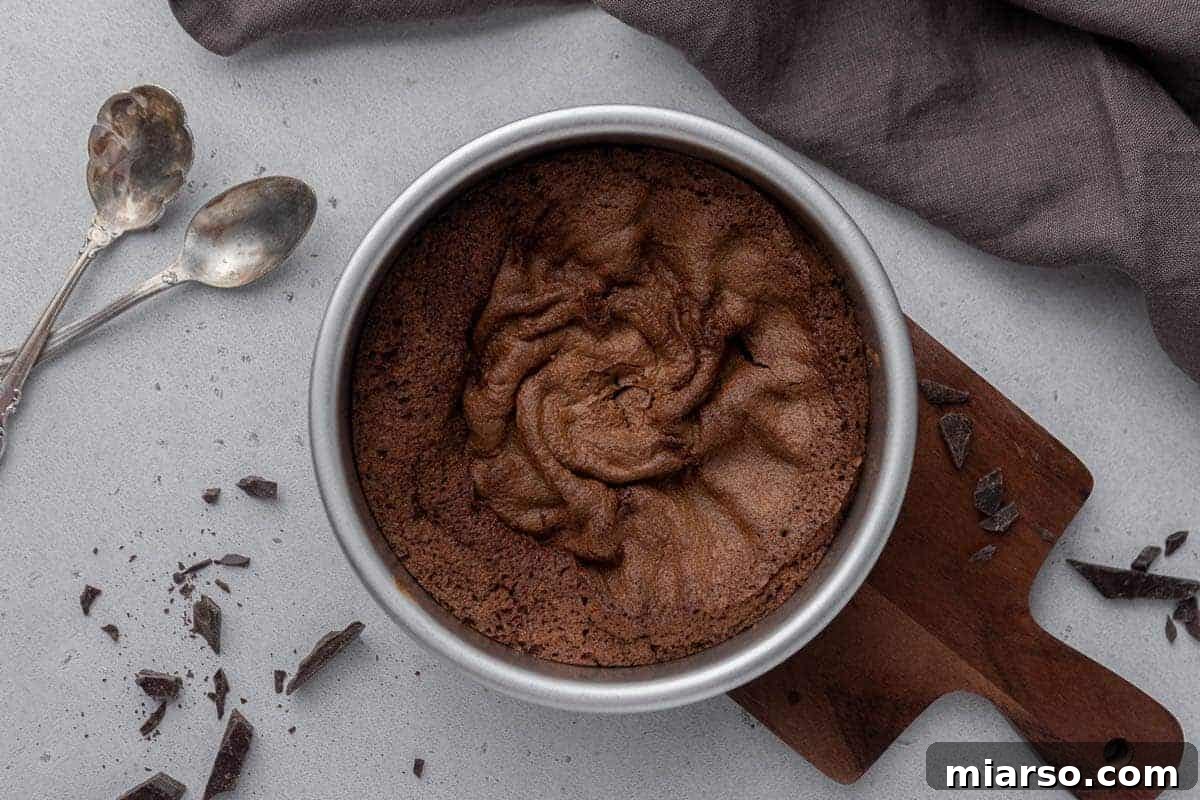 Appetizing crinkly-top air fryer brownies, showcasing their perfectly baked texture and inviting appearance.