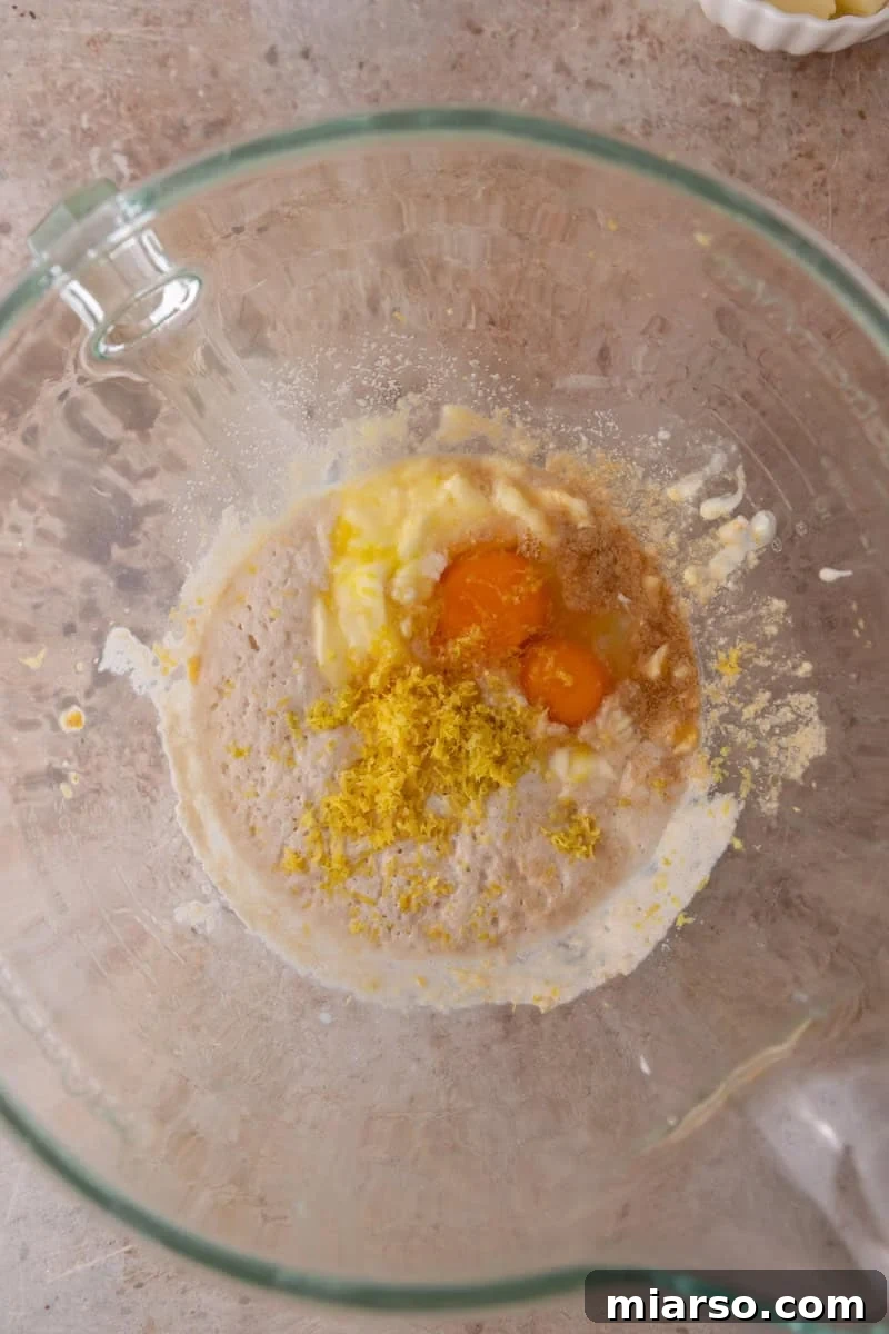 Eggs, lemon zest, butter and tangzhong in a stand mixer bowl before mixing