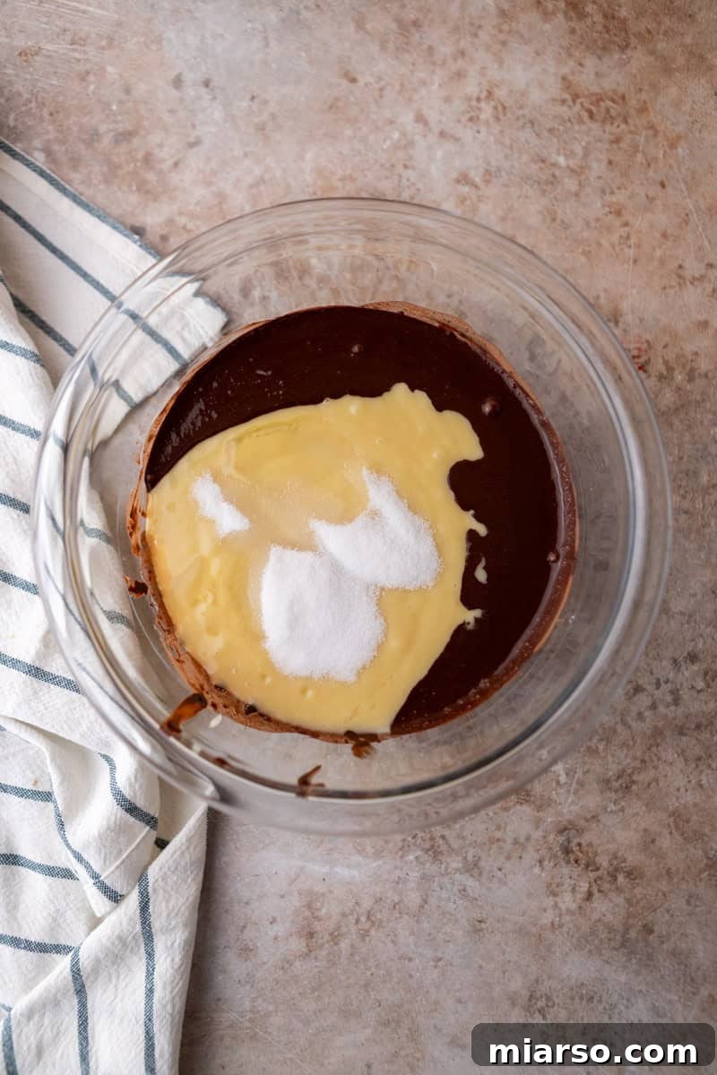Ultimate Moist Marble Layer Cake with Rich Chocolate Cream Cheese Frosting 9 Vanilla cake batter and extra sugar added to the bloomed cocoa paste to create the chocolate marble batter