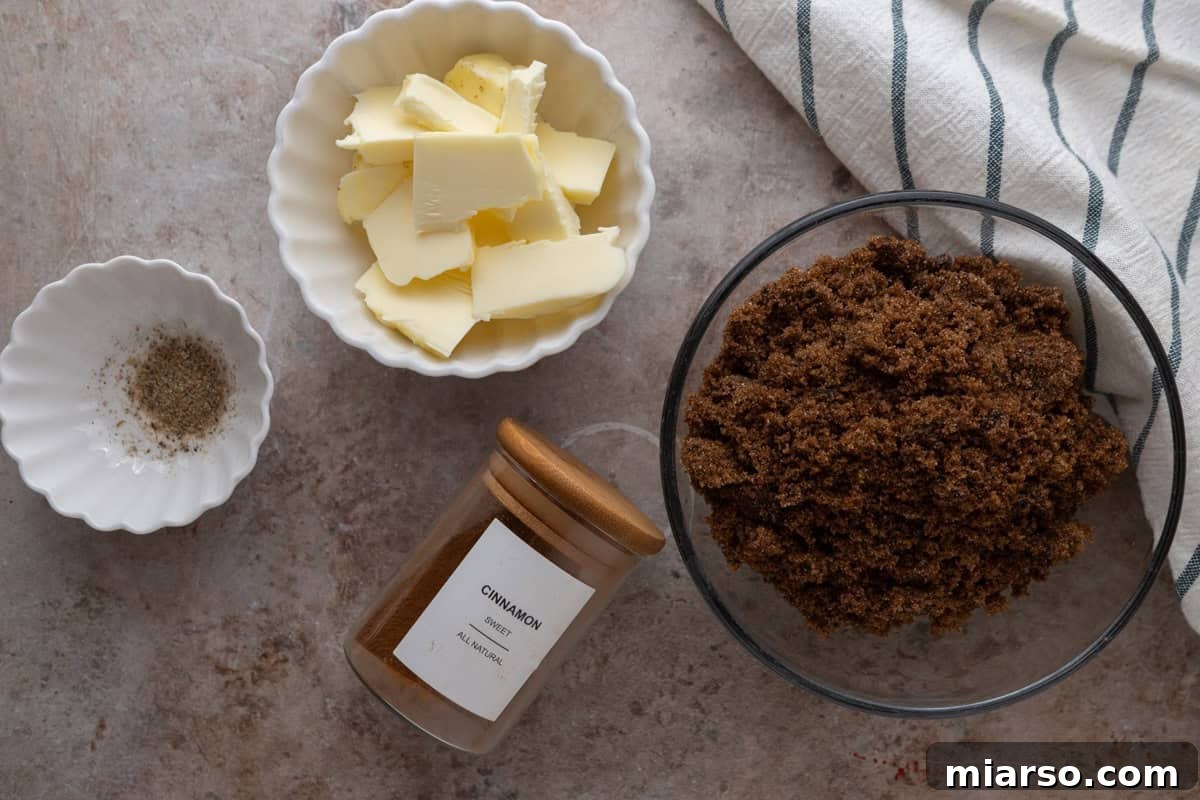  Cinnamon roll filling ingredients including softened butter, brown sugar, ground cinnamon, and ground cardamom
