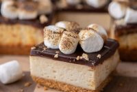 Toasted Marshmallow S’mores Cheesecake Bars – Gooey Campfire Dessert